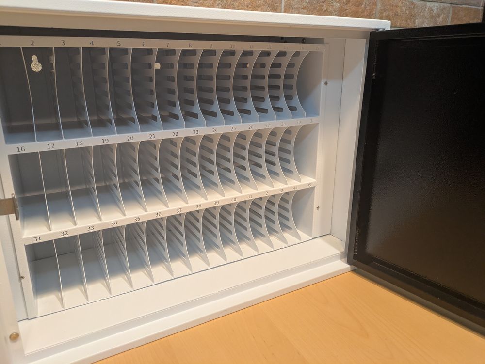 Inside the Avelogic Phone Locker: three rows of 15 numbered slots